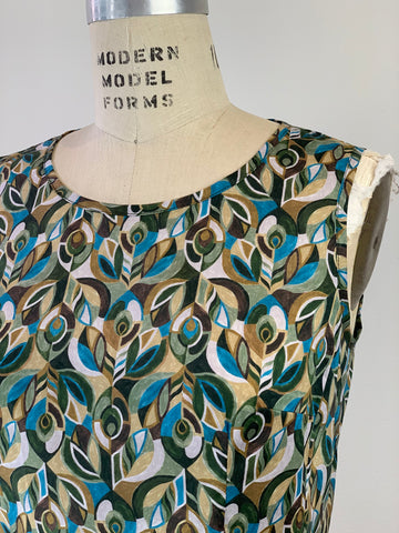 BUTTON BACK JEWELLED PEACOCK POP TOP